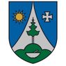 Ein Schild, der in zwei Teile geteilt ist, der linke Teil ist blau mit einer gelben Sonne und der rechte Teil ist grau mit einem weißen Kreuz. Unten befindet sich ein grünes Feld mit einer weißen Schüssel.