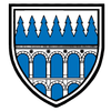 Ein blau-weißes Schild mit einer Reihe von Bögen und einer Reihe blauer Bäume oben.