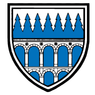 Ein blau-weißes Schild mit einer Reihe von Bögen und einer Reihe blauer Bäume oben.