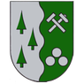 Ein Schild, das durch eine wellenförmige Linie geteilt ist. Links drei grüne Bäume. Rechts ein gekreuzter Hammer und drei weiße Baumstämme.