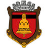 Ein Wappen zeigt eine goldene Glocke auf rotem Hintergrund, oben flankiert von einer Burg und unten mit braunen Zierelementen.