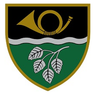 Ein Schild mit schwarz-grüner Aufteilung, oben mit einem Horn und unten mit Blättern, auf weißem Hintergrund.
