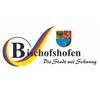 Das Logo von Bischofshofen, einer Stadt mit einem Wappen, das einen blauen und roten Schild mit einem Adler, einem Schwert und einem Löwen zeigt. Der Stadtslogan lautet 'Die Stadt mit Schwung'.