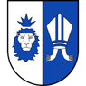 Das Bild zeigt einen heraldischen Schild, der in zwei Abschnitte geteilt ist. Der linke Abschnitt zeigt einen gekrönten Löwen mit blauem Mähnen, und der rechte Abschnitt zeigt die Mitra eines Bischofs.