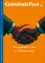 Das Cover zeigt zwei Hände, die sich auf stilisierte Weise auf einem orangefarbenen Hintergrund schütteln. Der Text lautet Handelsbetriebe in Wimpassing und gibt den Titel der Veröffentlichung an.