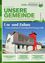 Die Titelseite eines Gemeindeinformationsblattes zeigt ein modernes Feuerwehrhaus mit einem roten Turm und weißem Körper. Es hebt den Neubau und Ausbau des Feuerwehrhauses in Zwaaring-Pils hervor.
