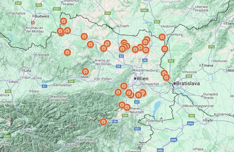 Karte mit verschiedenen Orten und Straßenrouten in Österreich, gekennzeichnet durch rote Kreise, einschließlich Städte wie Wien, Sankt Pölten und Bratislava, mit beschrifteten Autobahnen und Straßen.