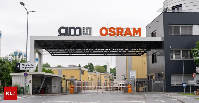 Der Eingang zu einem Industriegebiet zeigt ein großes Schild mit der Aufschrift 'am OSRAM'. Fahrräder sind links geparkt. Das Gebiet ist mit einem Tor und Schranken umzäunt.