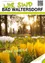 Die Titelseite eines offiziellen Gemeindeinformationsblattes zeigt einen Park mit blühenden Blumen und zwei Personen, die spazieren gehen. Die Sonne scheint hell im Hintergrund. Es stammt aus Bad Waltersdorf, datiert auf März 2022.