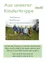 Ein Poster mit dem deutschen Text 'Kinderkrippe'. Darunter ist ein Bild von sechs Kindern in Winterkleidung, die auf einem Grasfeld stehen. Sie lächeln und scheinen für ein Foto zu posieren. Im Hintergrund befindet sich ein weißes Gebäude.
