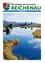 November 2022 Magazin-Cover mit einem ruhigen See, der Berge und Bäume auf der Wasseroberfläche reflektiert.