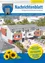 Ein Plakat zeigt eine Gemeindemitteilung. Die Überschrift lautet: 'Marktgemeinde Wollersdorf-Steinabruckl.' Ein Bild zeigt ein neues Mehrfamilienhaus. Darunter steht: 'Startschuss Hauptplatz-Projekt Wollersdorf. Englisch-Förderung in den Kindergärten.'