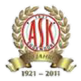 Das Emblem zeigt einen Lorbeerkranz um die Buchstaben 'ASK' in Rot, Gold und Weiß, mit einer darunterliegenden Schriftrolle, die '1921-2011' steht. Der Entwurf ist von einem schwarzen Rahmen umgeben.