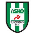 Das Bild zeigt das Logo des ASKO Klingenbach Sportvereins, gegründet 1945. Das Logo besteht aus einem Schild mit grünen und weißen Streifen, dem Vereinsnamen 'ASKO' in Fettdruck und 'KLINGENBACH' darunter. Eine rote Figur ist zentral positioniert.