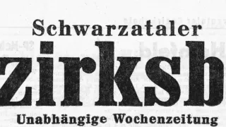 An old advertisement in German for 'Schwarztafel' and 'irks' with a mention of 'unabhängige Wochenzeit'.