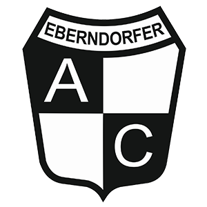 Das Logo für AC Eberndorfer, mit einem Wappendesign, das die Buchstaben AC in Weiß und Schwarz auf schwarzem Hintergrund zeigt.