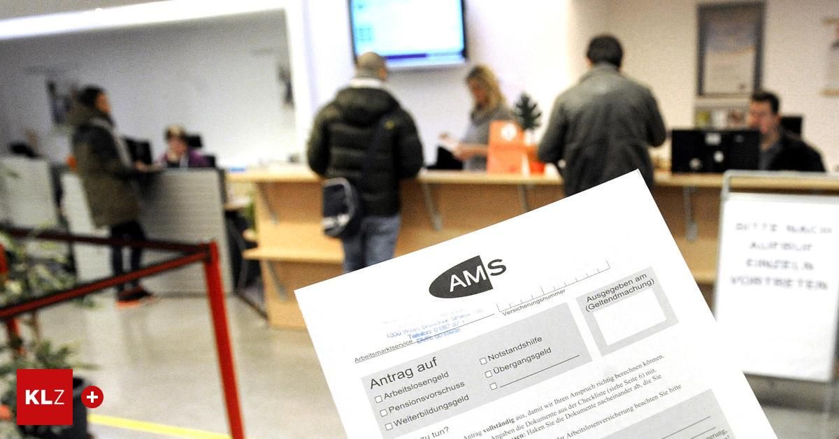 A blurry image of people at a reception desk with a form labeled AMS in front.