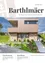 Ein Zeitschriftencover zeigt ein modernes Haus mit Holzfassade und großen Fenstern. Der Titel hebt eine neue öffentliche WC-Anlage hervor und erwähnt eine offizielle Eröffnung.