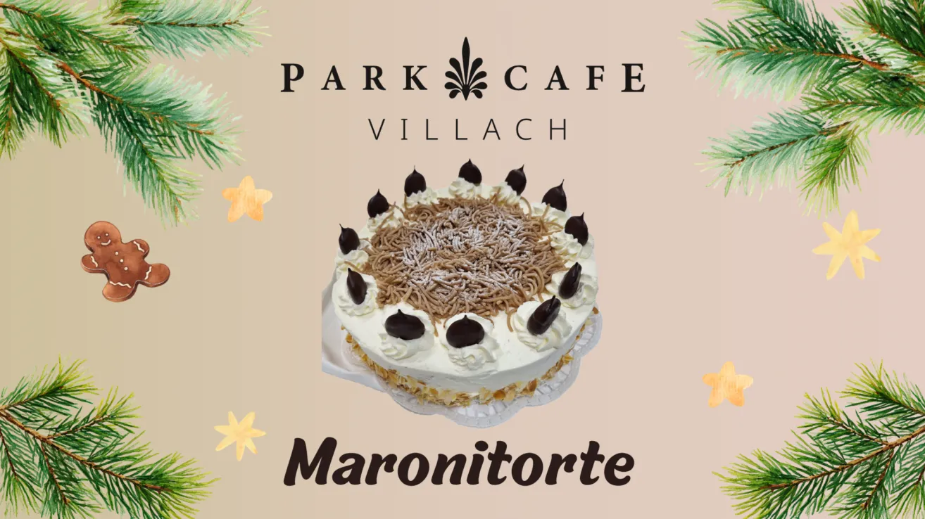 Ein Kuchen von Park Cafe Villach namens 'Maronitorte' zeigt eine Schicht Kastanien auf weißem Creme, umgeben von Schokoladenstückchen. Der Kuchen liegt auf einem dekorativen Teller.