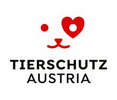 Das Logo von Tierschutz Austria zeigt ein stilisiertes Tiergesicht mit roten Augen und einem Herz auf weißem Hintergrund.