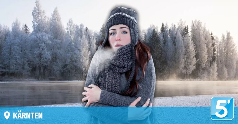 Eine Frau in einem grauen Winteroutfit steht in einer verschneiten Landschaft, hüllt sich in sich selbst und sieht fröstelnd aus.