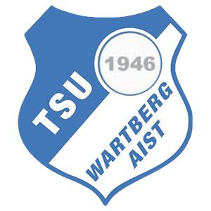 Das blau-weiße Logo zeigt den Text 'TSU Wartberg AIST'. In der Mitte befindet sich ein weißer Kreis mit dem Jahr '1946'. Das Design ist in Form eines blauen Schildes gehalten.