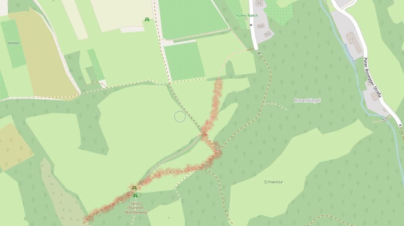 Eine Karte, die ein ländliches Gebiet mit einer roten Linie zeigt, die einen Pfad oder eine Route anzeigt. Die Karte enthält Namen wie Saturn, Planeten und Wanderweg. Es gibt auch nummerierte Punkte wie 101, 103 und 95.