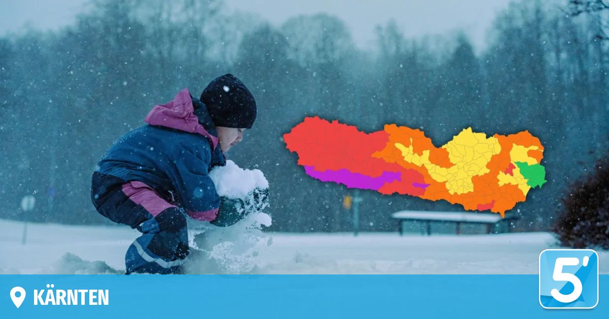 A child playing in the snow with a colorful map of a region in the background.