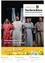 Ein Poster für 'Passionsspiele 2026' zeigt eine Gruppe von Schauspielern in Kostümen. Die zentrale Figur ist ein Mann mit Bart und Robe, flankiert von einer Frau in einem blauen Kleid und einem anderen Mann in einem roten Gewand. Der Hintergrund zeigt eine Bühne mit weißen Vorhängen.