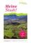 Ein Plakat zeigt eine landschaftliche Ansicht einer Stadt mit grünen Feldern, Bergen im Hintergrund und den Jahren 2020 bis 2024. Der Text 'Meine Stadt!' ist oben prominent angebracht.