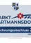 Ein Banner für den Hartmannsdorfer Markt, das den Entwurf des Haushaltsplans für 2022 und die Bevölkerungszahl von 2992 mit einer Landfläche von 2,924 Hektar zeigt.