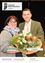 Ein Mann und eine Frau lächeln und posieren für ein Foto, während sie einen Blumenstrauß halten. Die Frau trägt eine Brille und einen Schal, und der Mann ist in einem grünen Anzug. Der Text lautet 'Neue Medizinerin Neuer Gemeinderat angelobt Netzausbau schreibt voran'.