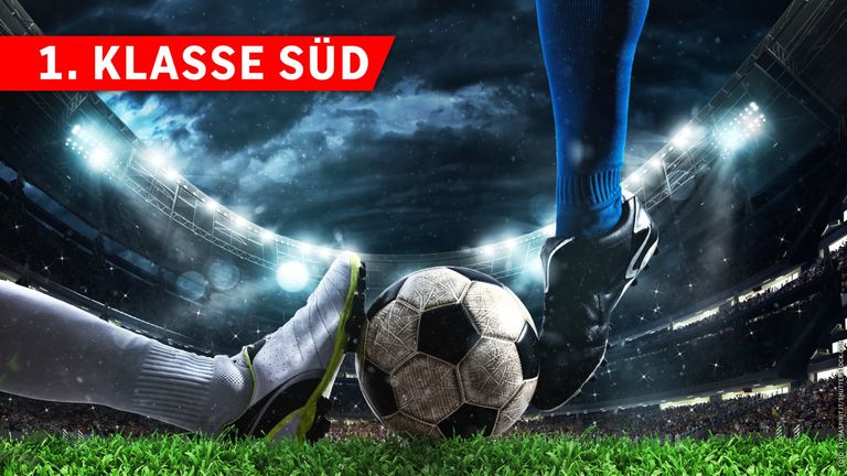 A soccer player kicks a soccer ball on a stadium field with text 'SSE SUD' on the top.