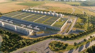 Eine Luftaufnahme eines großen Gebäudes mit einem mit grünen Pflanzen bedeckten Dach, das einem Solarpark ähnelt.