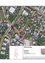 Eine Karte zeigt verschiedene Straßen und Gebäude in einer Stadt. Die Hauptstraße, Tragweiner Straße, ist prominent mit mehreren Kreuzungen dargestellt. Bemerkenswerte Orte umfassen ein großes rotes Kreuz an einer Kreuzung und ein kleineres grünes Kreuz.