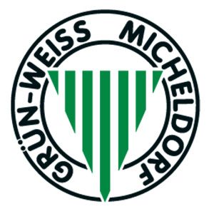 Das Logo des FC Grün-Weiss Micheldorf, mit einem grün-weißen Schild und einem stilisierten grünen Blatt in der Mitte.