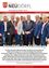 Eine Gruppe formell gekleideter Männer posiert für ein Foto auf einer Konferenz. Der Text am unteren Rand besagt, dass sich kommunale Führungskräfte aus Österreich jährlich auf dem Stadtetag treffen, um kommunale Finanzaufgaben zu diskutieren.