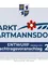 Ein Plakat wirbt für 'Markt Hartmannsdorf' mit einem Wappen, das einen Wolf und eine Krone zeigt. Das Plakat enthält eine Blume und ein blaues Band. Der Text 'ENTWURF Version 2.0' und '1. Nachtragsvorschlag 202' ist ebenfalls angezeigt. Bevölkerungsdaten und Fläche sind unten vermerkt.
