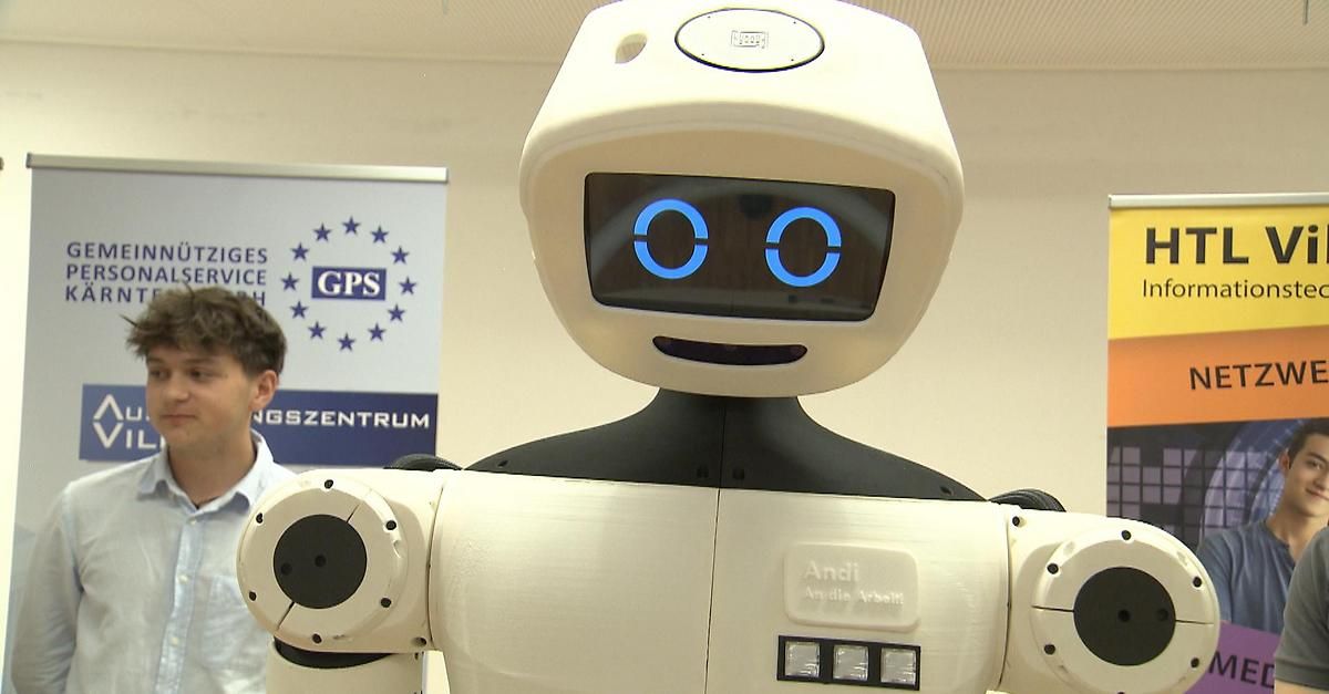 Ein weißer Roboter mit blauen Augen steht vor einem Banner mit der Aufschrift GPS.