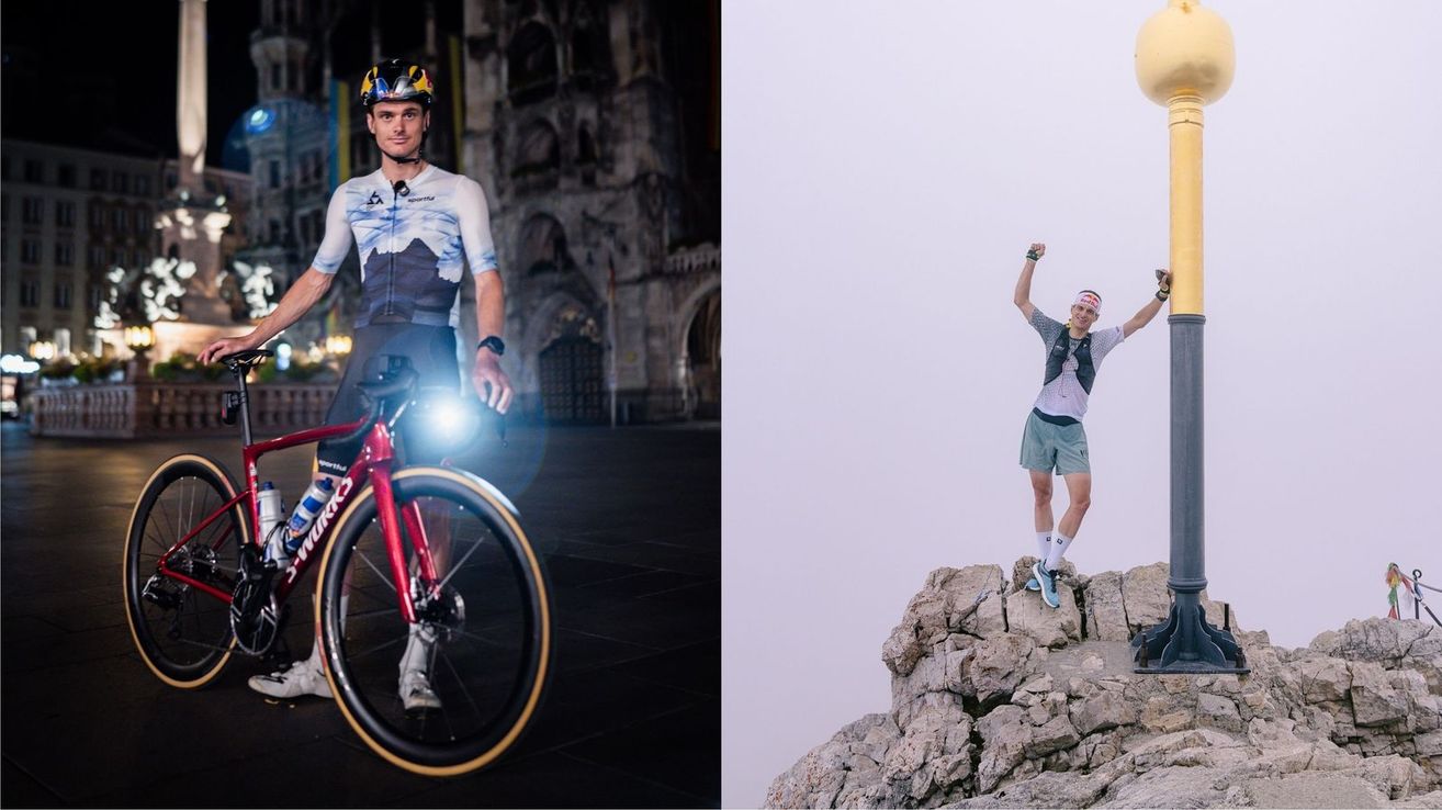 A man in a cycling jersey with a bicycle in front of a cathedral and another man on a rock, arms raised, wearing a headband and wristband.