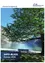 Ein ruhiger See mit einer Bank unter einem Baum an einem sonnigen Tag. Berge im Hintergrund und klarer blauer Himmel. Das Bild hat einen blauen Rand und das Wort 'INFO' ist links.