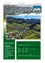 Ein Plakat, das ein Dorf mit einer malerischen Bergkulisse bewirbt. Es enthält eine Telefonnummer und Öffnungszeiten für ein lokales Büro.