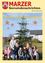 Eine Gruppe von Kindern und einer Frau steht vor einem geschmückten Weihnachtsbaum mit gelbem Hintergrund und Sternen. Das Bild ist von einem Zeitschriftencover.