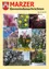Eine Collage verschiedener Frühlingsblumen und Osterdekorationen, darunter rosa und weiße Blüten, gelbe Tulpen und eine Hasenfigur. Die Collage trägt den Titel 'Frohe Ostern!' und ist auf einem gelben Hintergrund gesetzt.