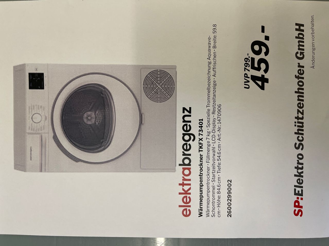 Das Bild zeigt ein Etikett für einen weißen elektrischen Trockner. Es enthält Modellnummer, Spezifikationen und Preis.