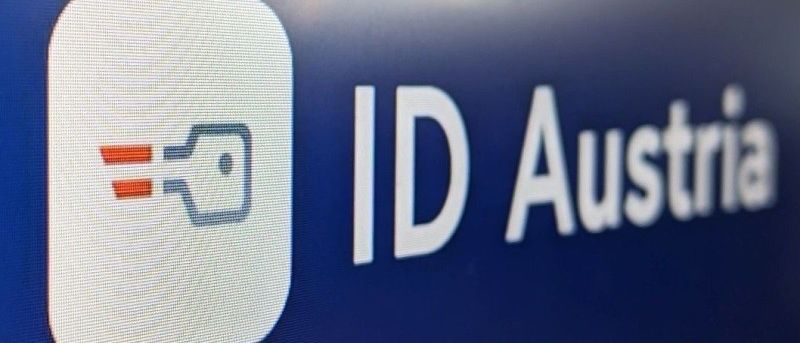 Ein blauer Hintergrund zeigt das ID Austria Logo. Das Logo hat weißen Text mit einem blauen Symbol auf der linken Seite.