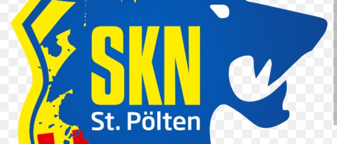 Das SKN St. Polten Logo zeigt ein Wolfskopf-Design in Blau und Gelb. Es hat den Text SKN und St. Polten in weißen und gelben Schriftarten.