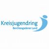 Das Logo des Kreisjugendring Berchtesgadener Land wird auf einem weißen Hintergrund angezeigt. Der Text 'Kreisjugendring' ist in Blau geschrieben, und 'Berchtesgadener Land' steht in kleinerer blauer Schrift darunter. Eine blaue Silhouette einer Person ist rechts neben dem Text platziert.
