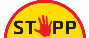 Ein gelbes rundes Schild mit einer roten Hand in der Mitte, das das Wort 'STOP' zeigt. Darunter steht in Schwarz 'der Gewalt an Frauen'. Der Hintergrund ist weiß.