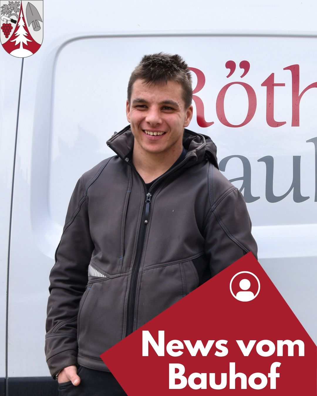 A smiling man stands in front of a white van with the text 'Roth' and 'au' on it, wearing a black jacket.